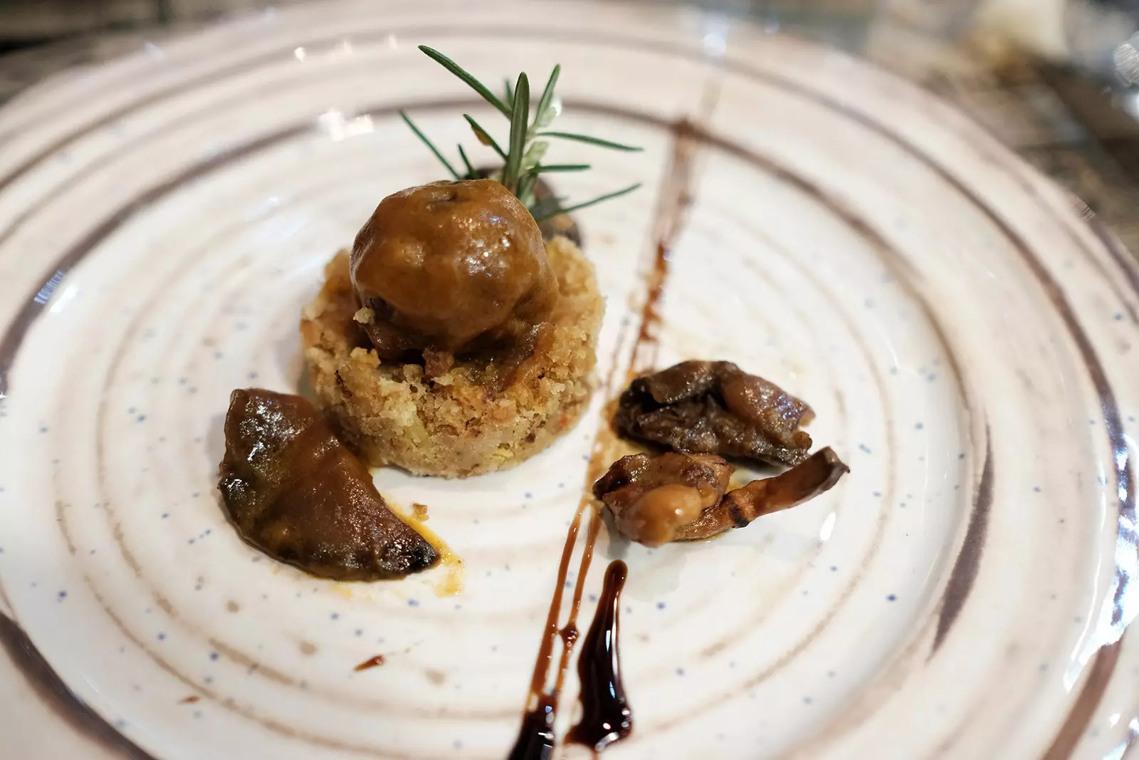 Bull's tail truffle on crumb biscuit and P.X. mushrooms. in Montecruz