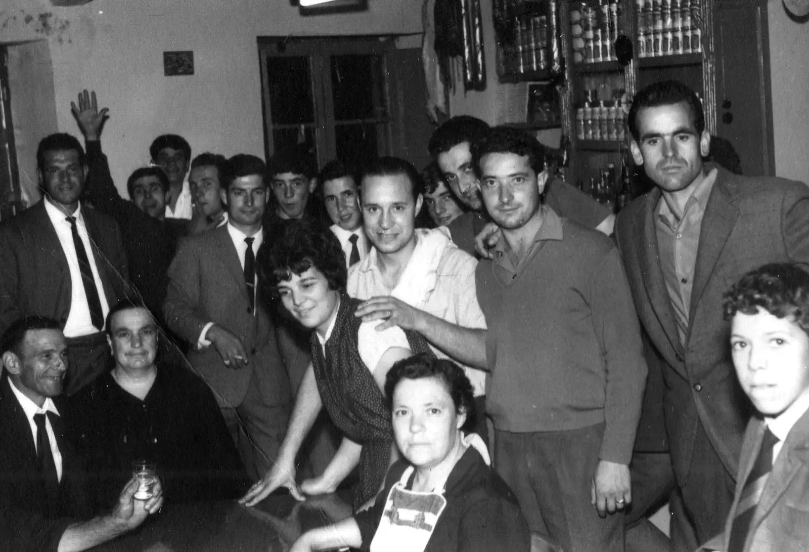 Josefa Castro, daughter of the founders, sitting in the foreground with family and friends from the tavern