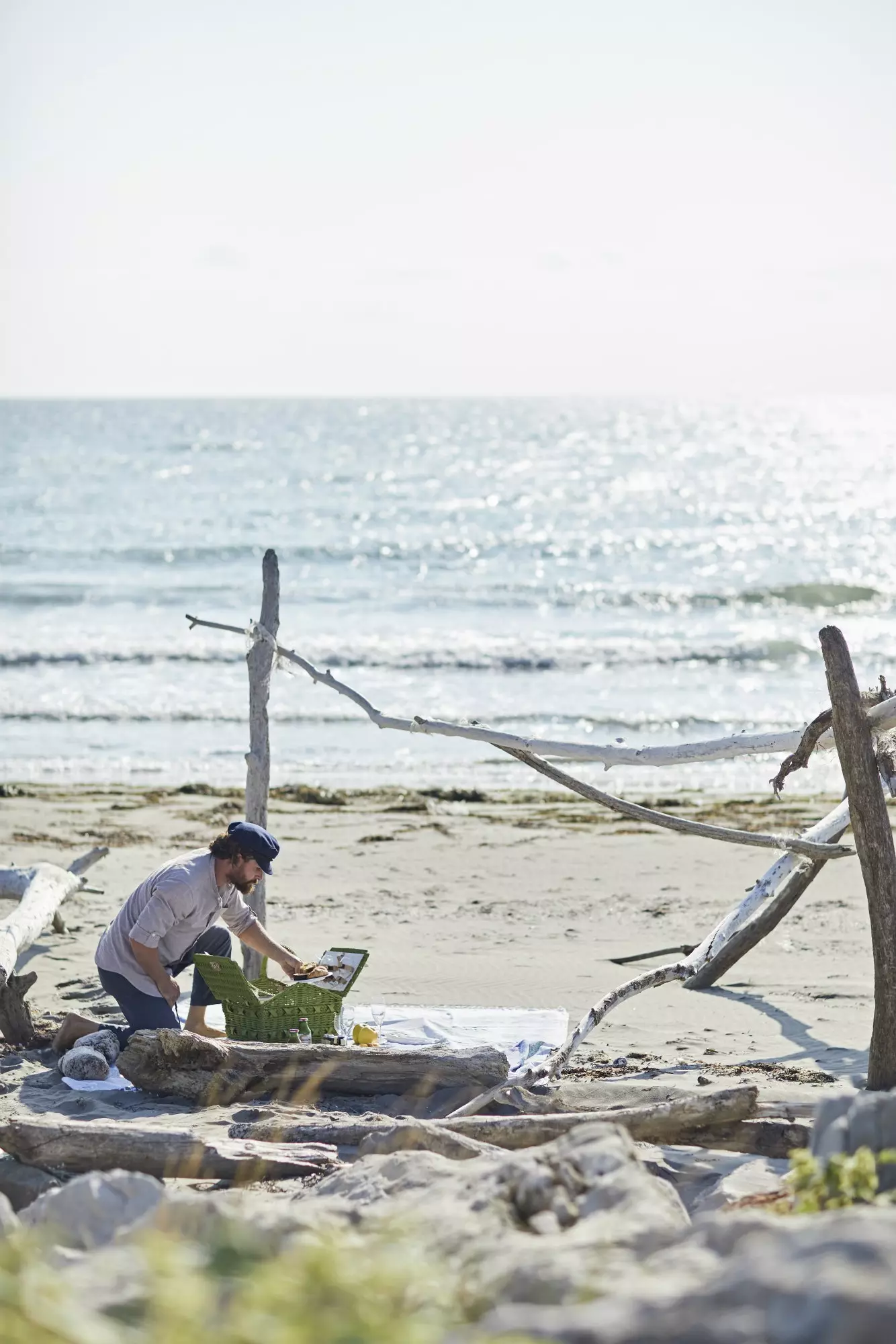 Exklusiv an entspaant Picknick um Sand vun der Insel Pellestrina südlech vun der Lagun.