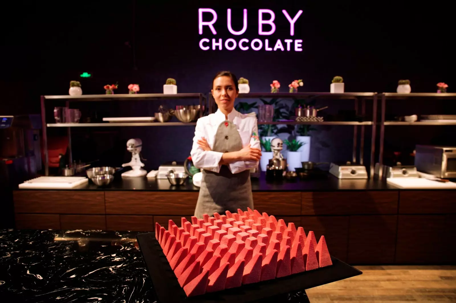 Dinara Kasko with her creation for Ruby Chocolate