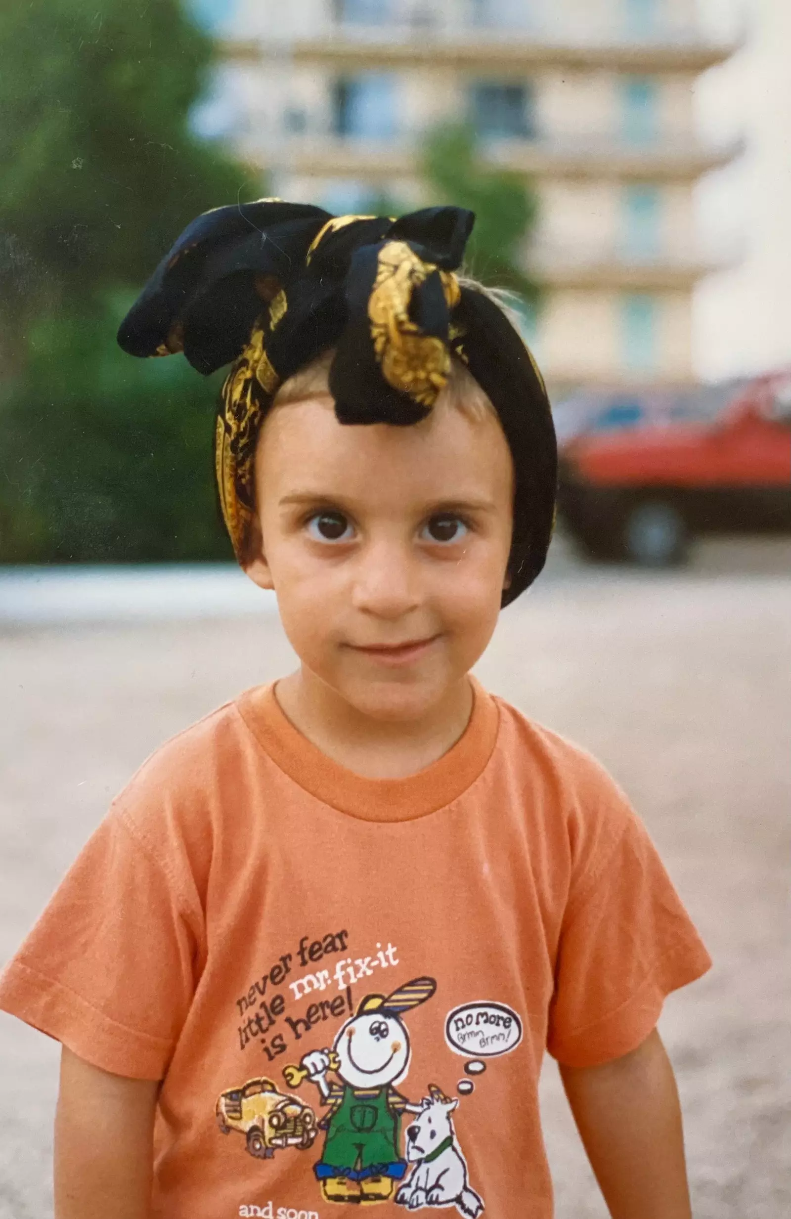 Childhood photo of Adrian Rubio wearing a headscarf