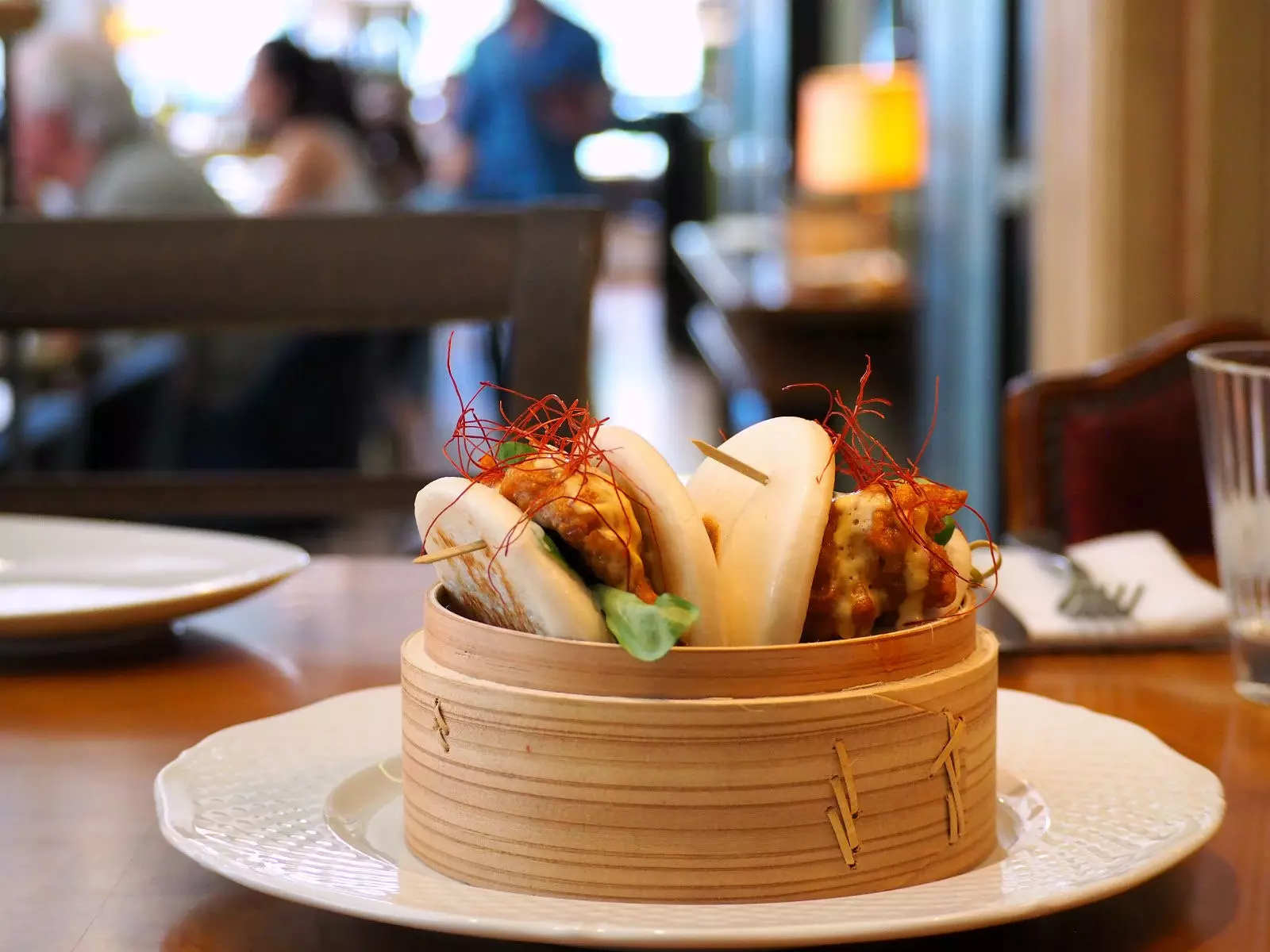 Crispy chicken bao with rocoto mayonnaise and mint yogurt.