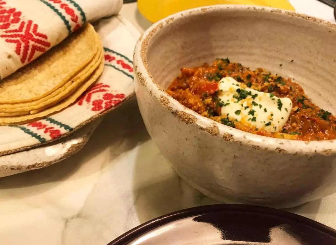 Taco talo de bacalhau ajoarriero enchilada de Topa Sukaldería