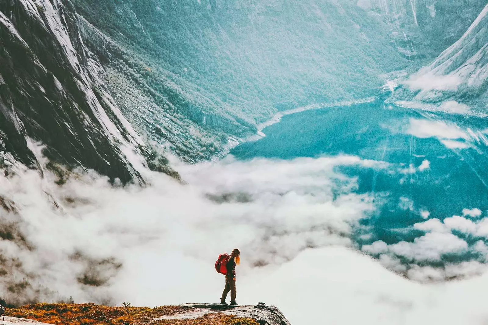 man jumping on rock