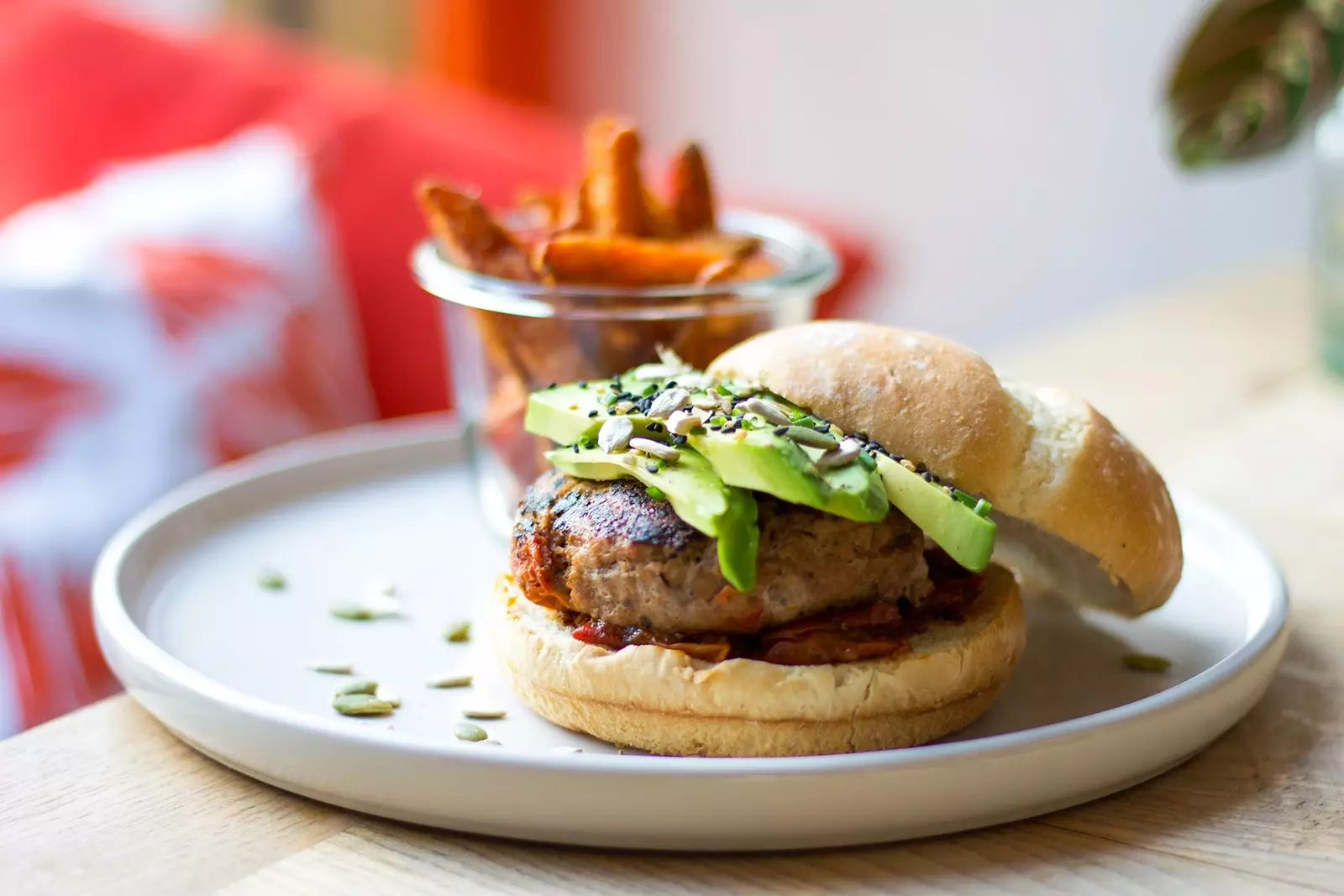 Religion's burger served with sweet potato