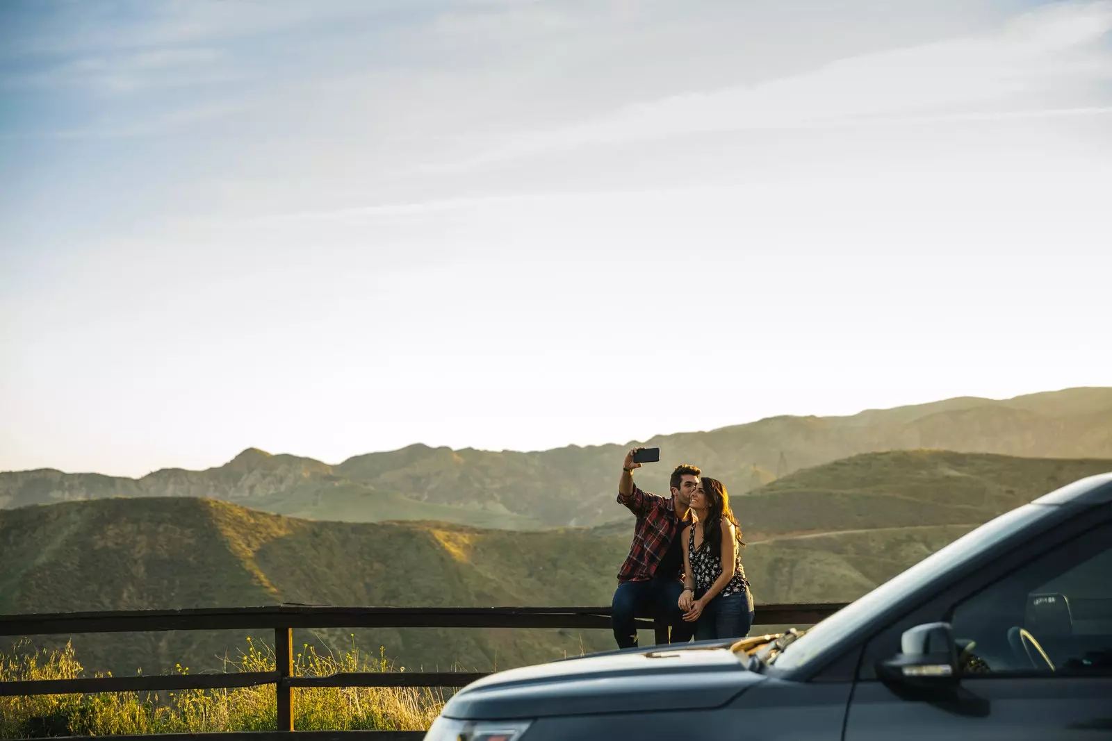 couple taking a selfie in the field