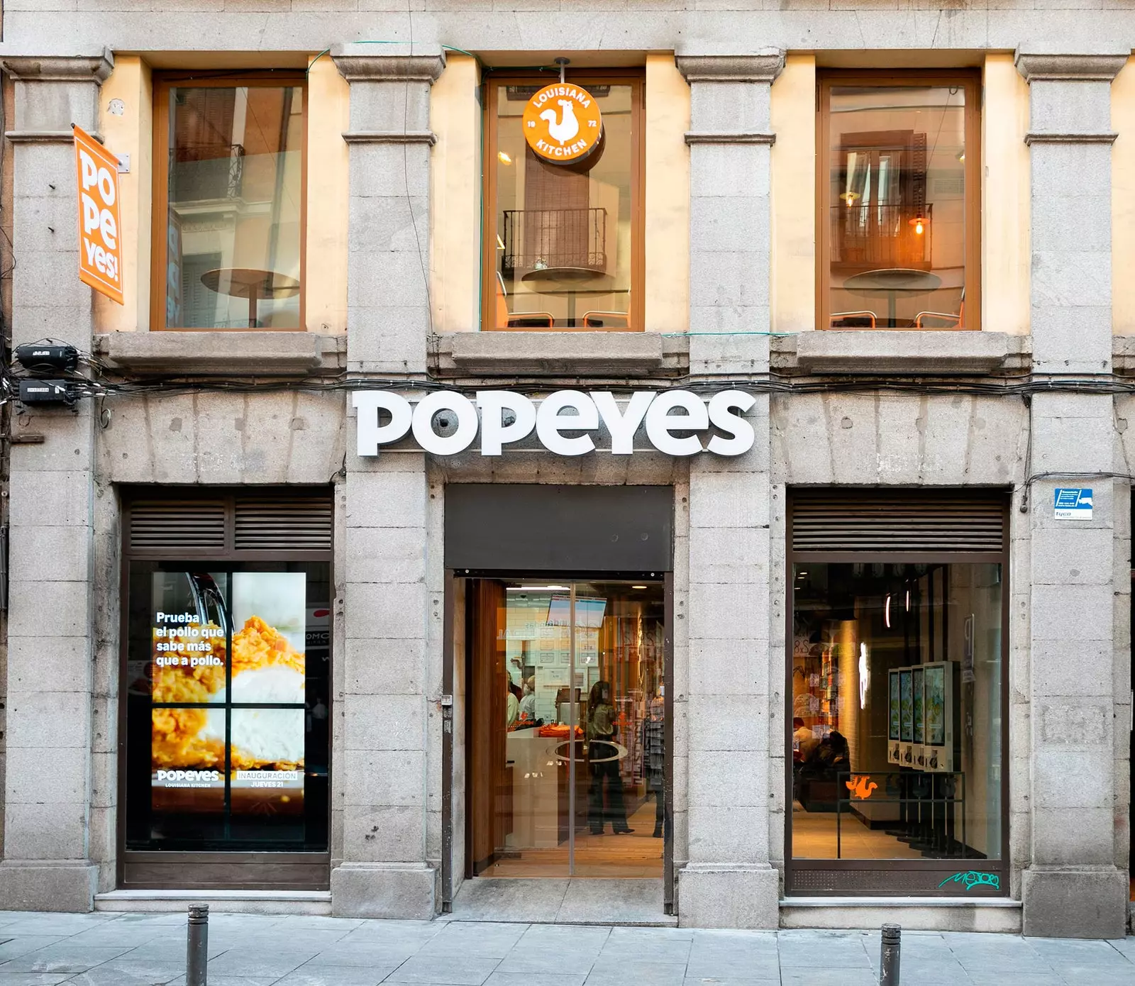 Popeyes kënnt zu Madrid Ode un amerikanesch schaarf frittéiert Poulet