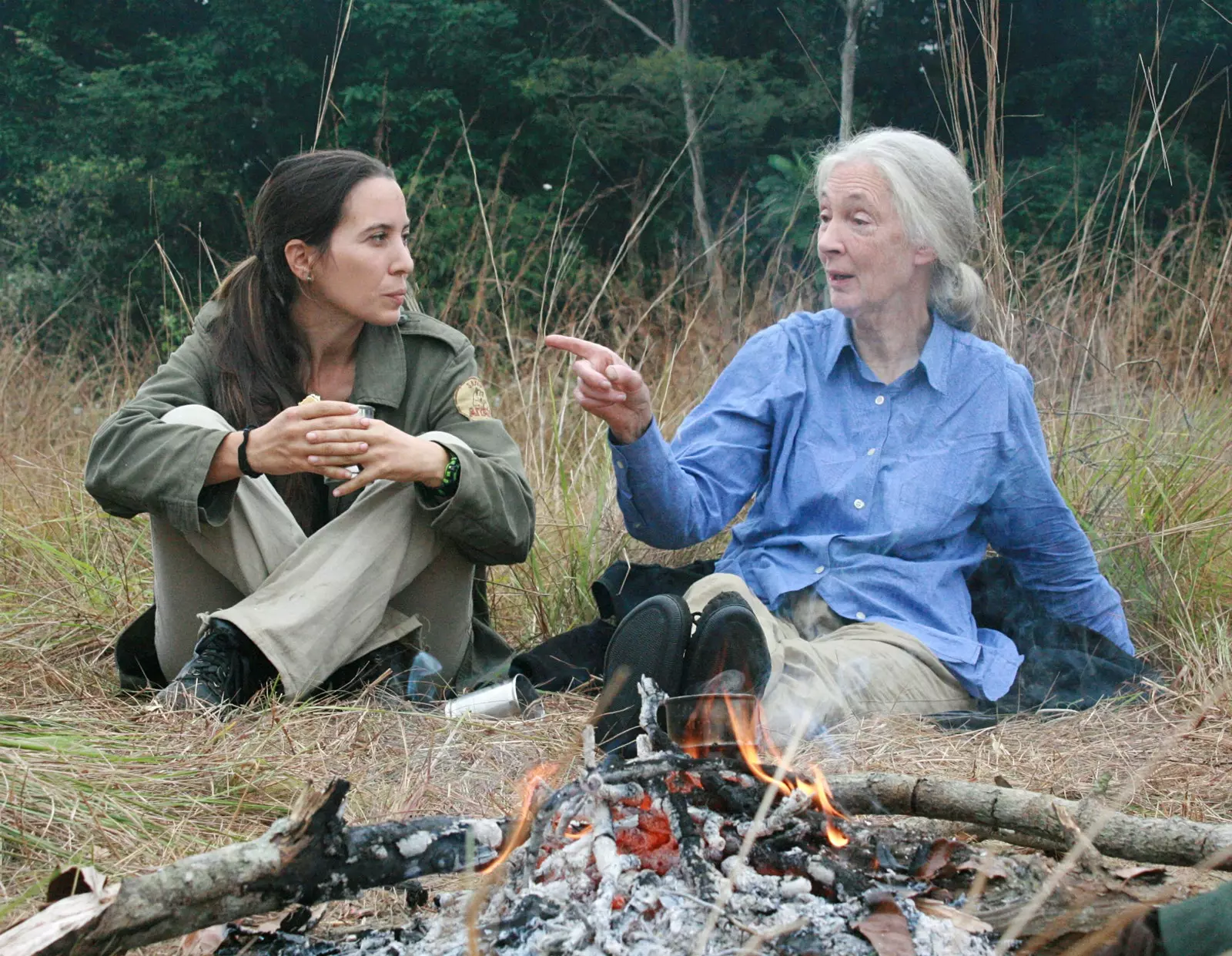 When Jane visits Tchimpounga they always build a fire and chat around the campfire.