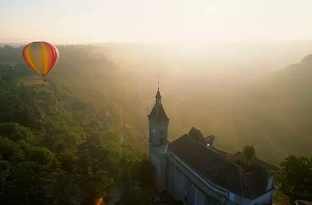 A balloon flies over the town