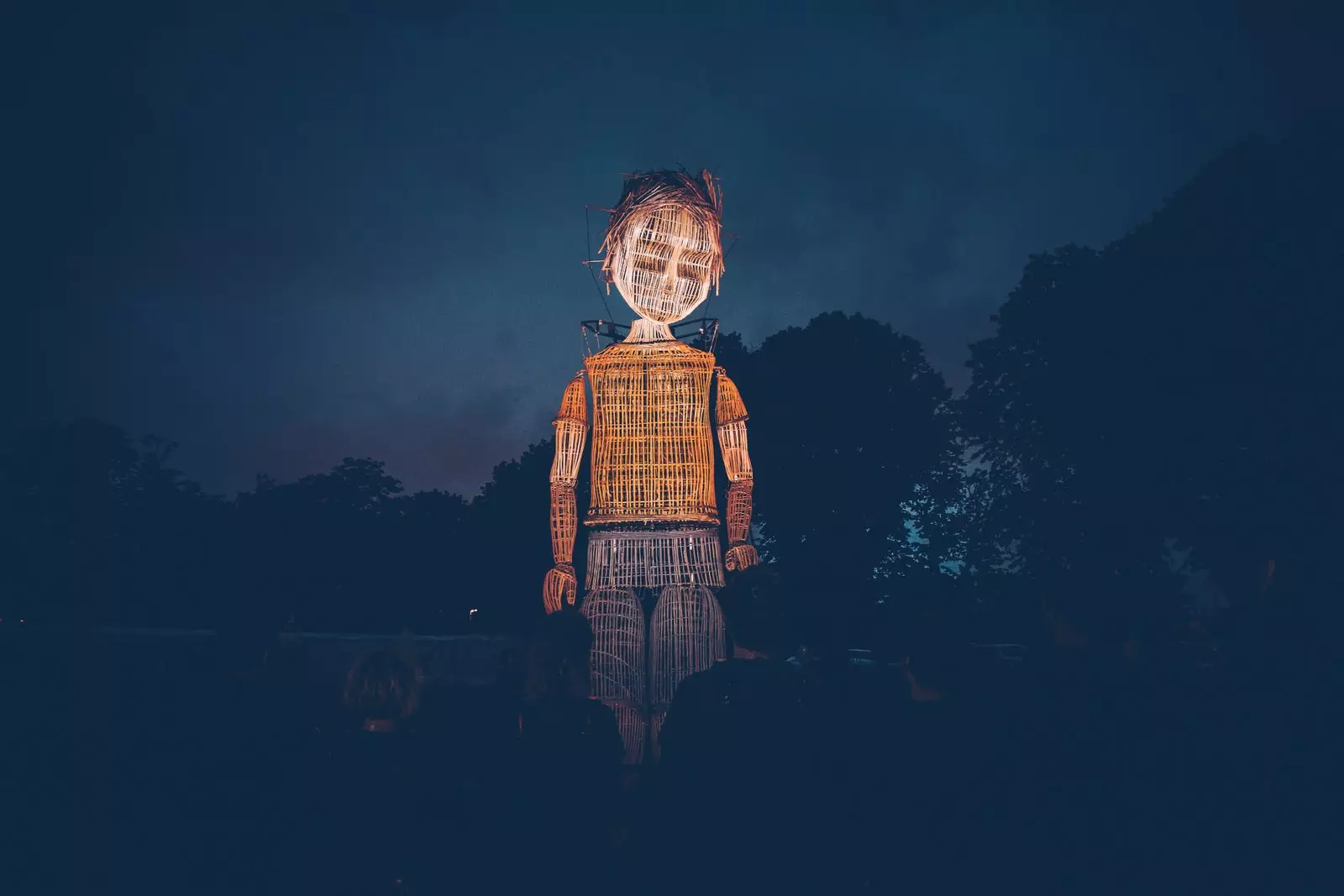 A wicker giant created by Benoit Mousserion participating in the Three Kings Parade.