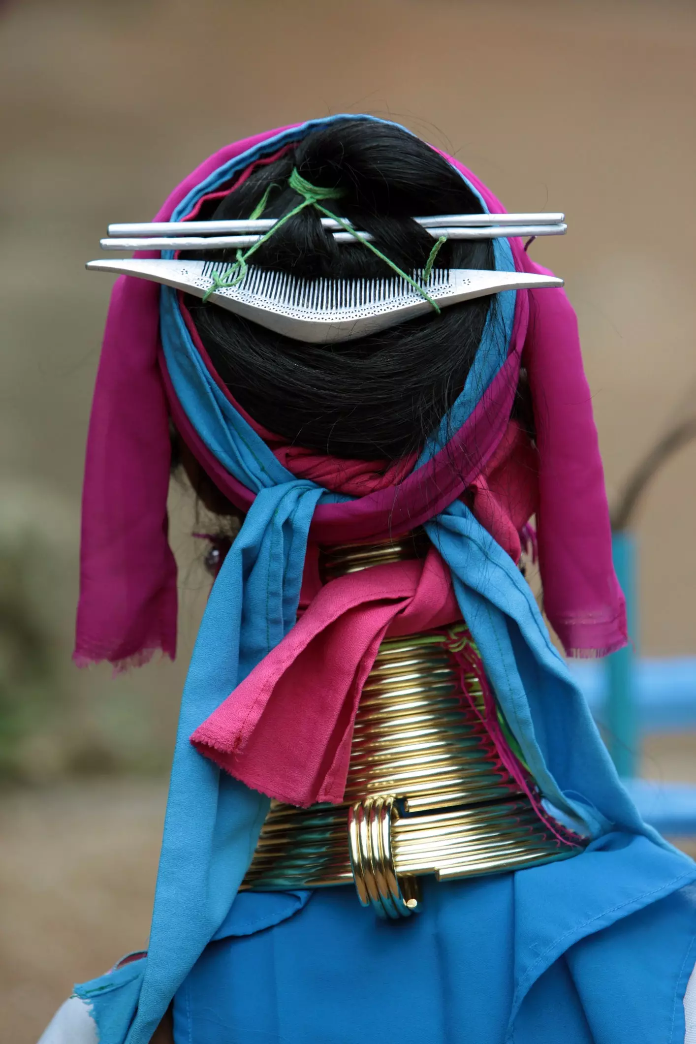 Padaung women wear neck rings that cause neck extension.