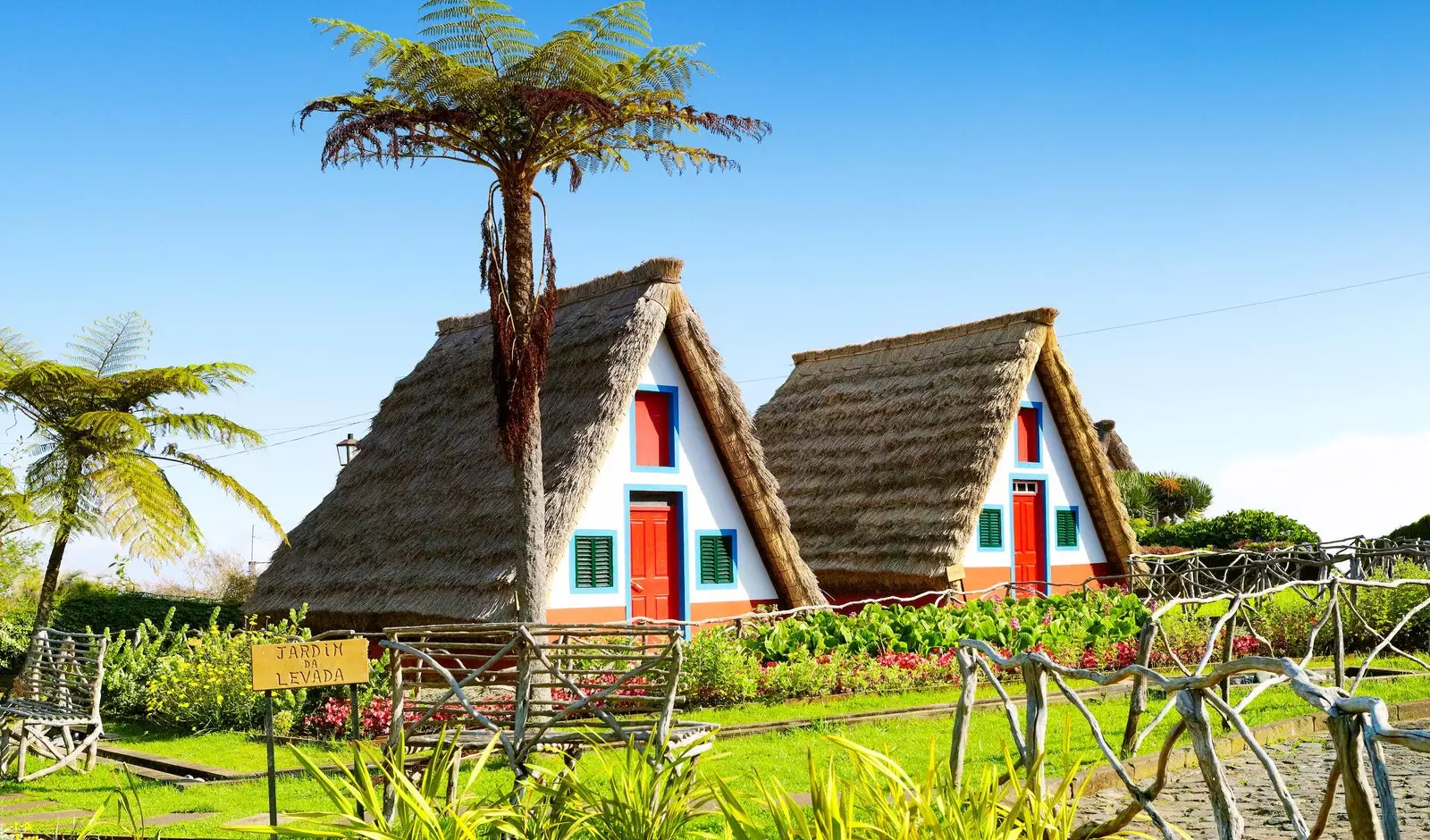 Traditional colorful Santana houses with gabled roofs.