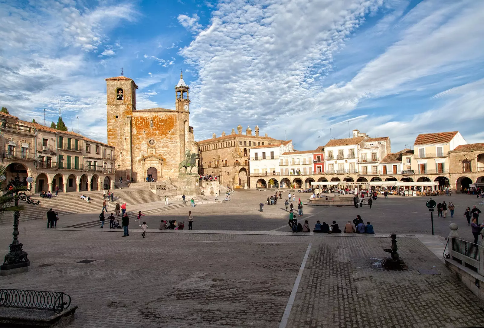 The whole town enjoying in the square of Trujillo