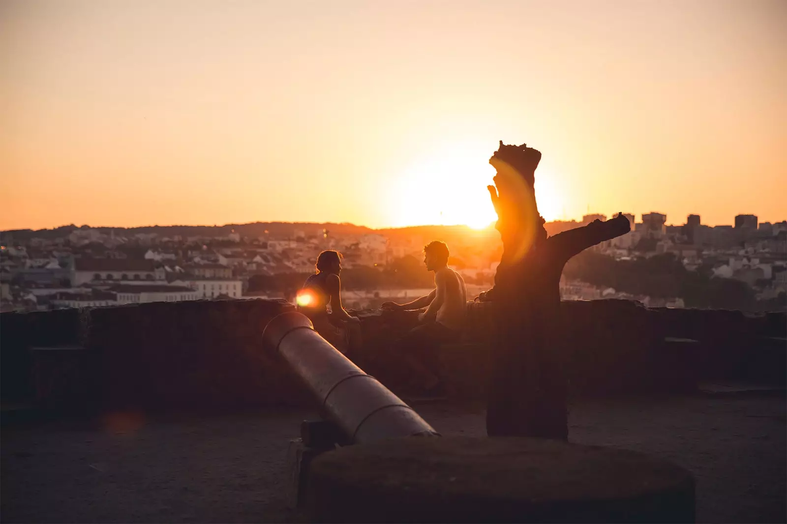 two people at sunset in lisbon