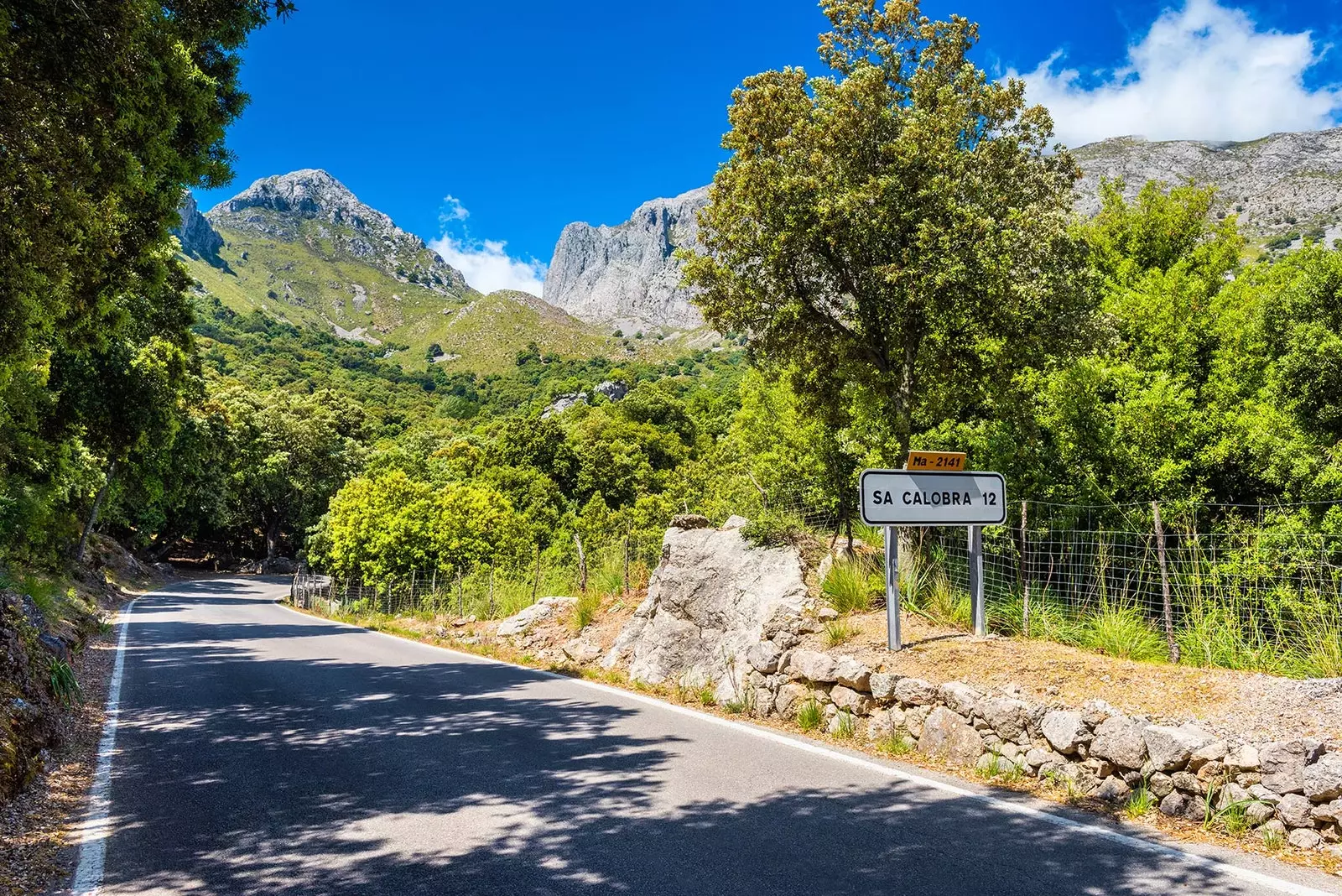 A sign indicates the direction to Sa Calobra