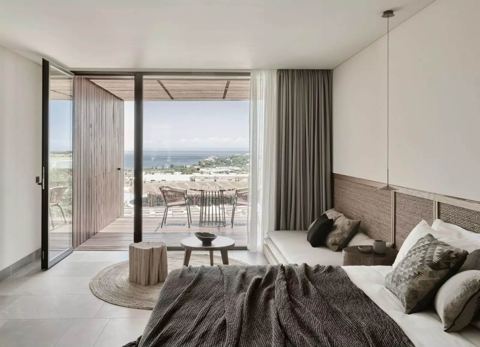 All rooms overlook the lagoon pool.