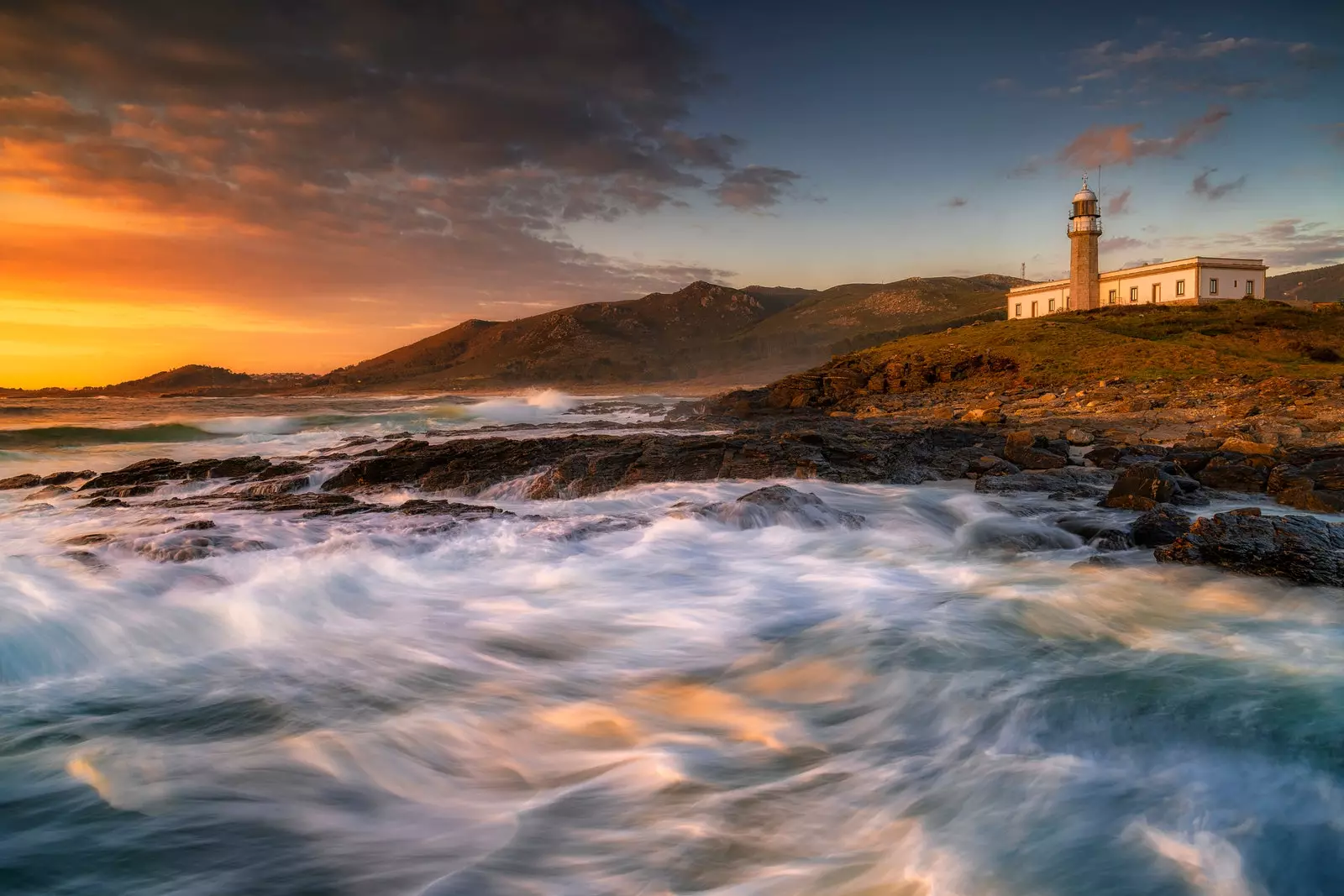 Coucher de soleil à Faro Lariño.