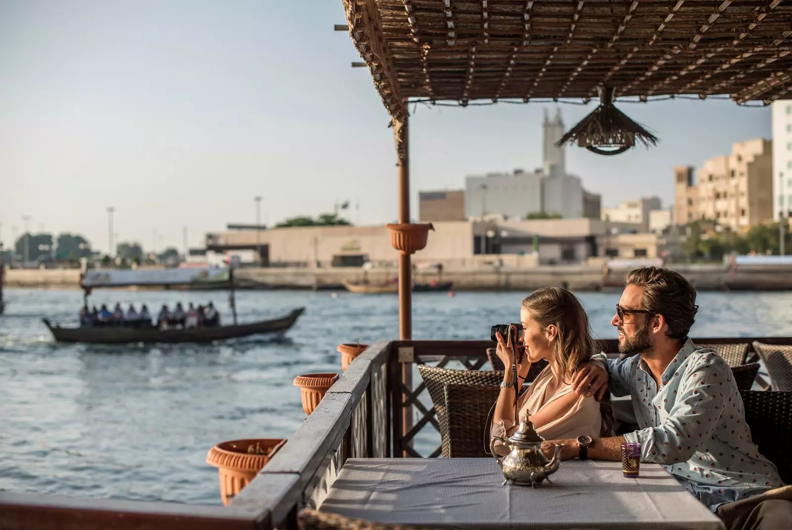 couple taking a photo in dubai marina