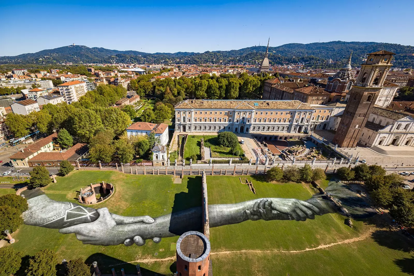 Giant hands of Beyond Walls Turin Italy