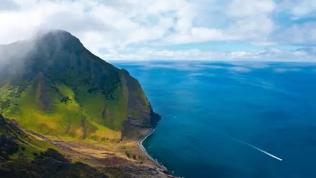 Mar a tháinig oileán Robinson Crusoe chun bheith ina pharadaí inbhuanaithe