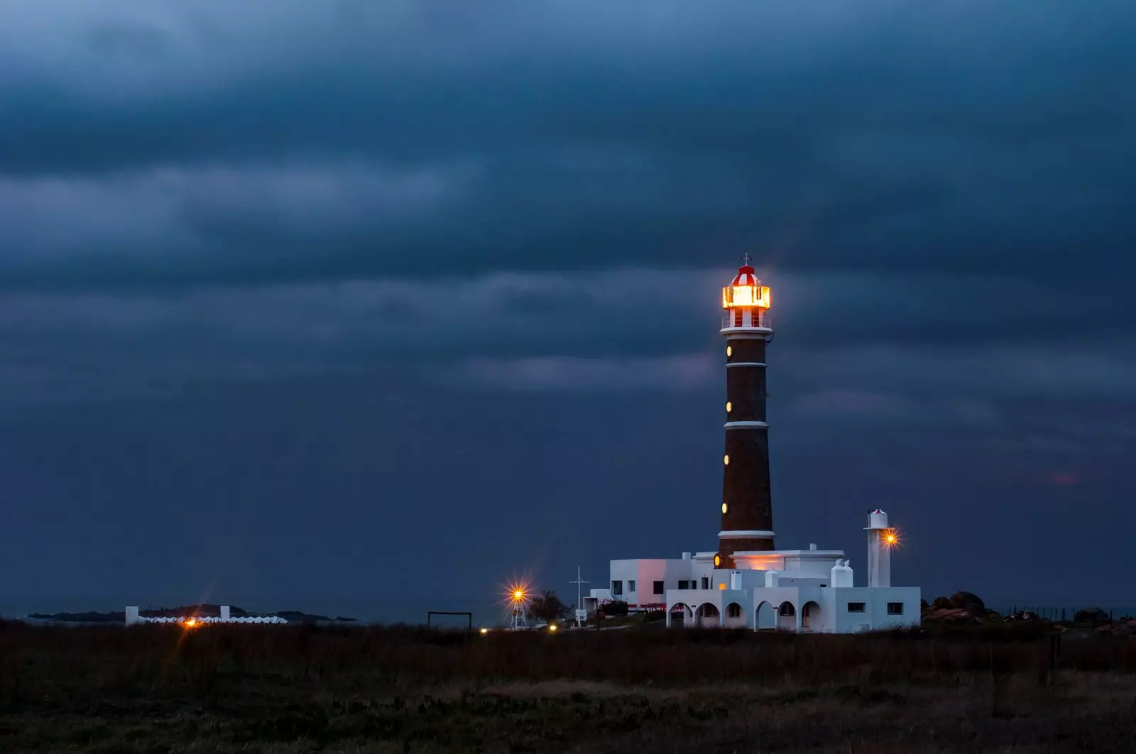 The only light comes from the Cabo Polonio lighthouse