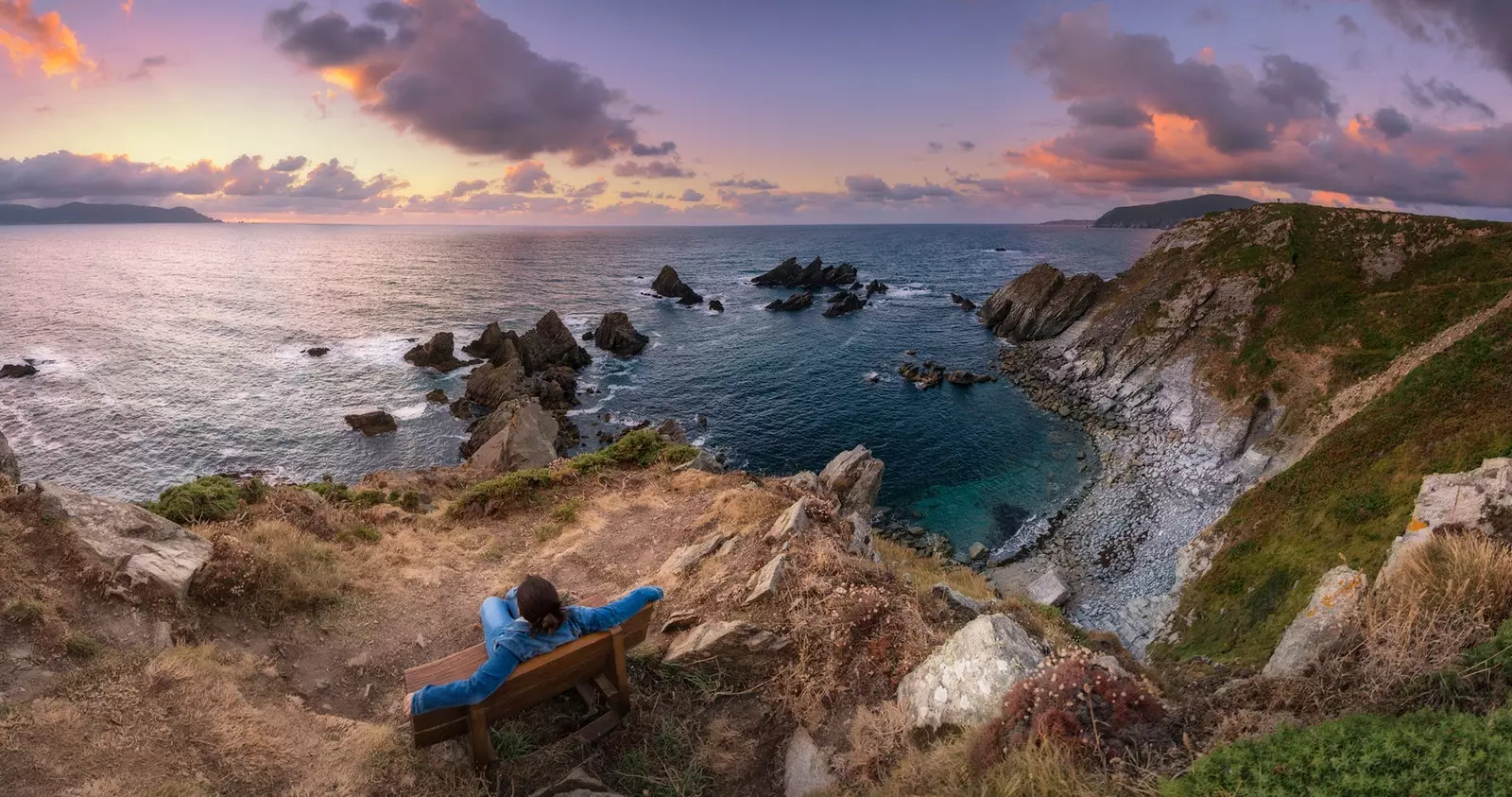 Galician resting on the most beautiful bench in the world