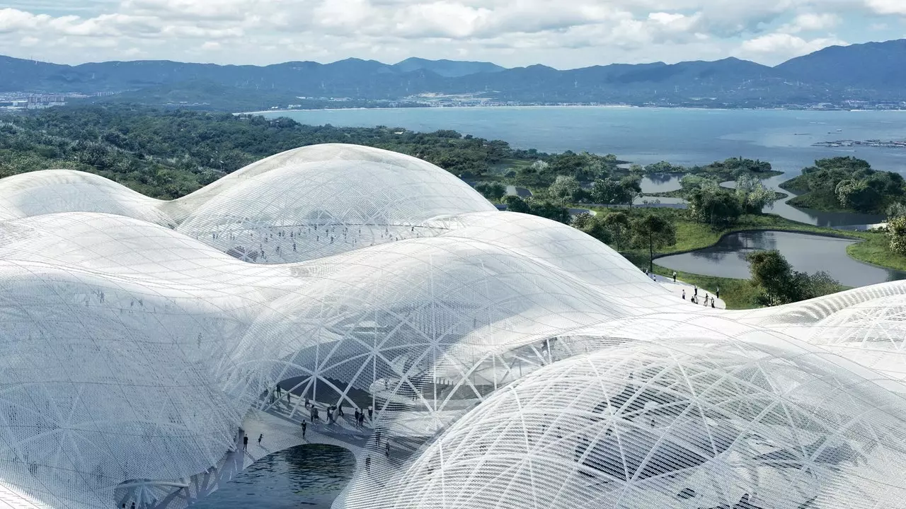 Het Shenzhen Maritiem Museum dat in verbinding staat met de wolken en de zee