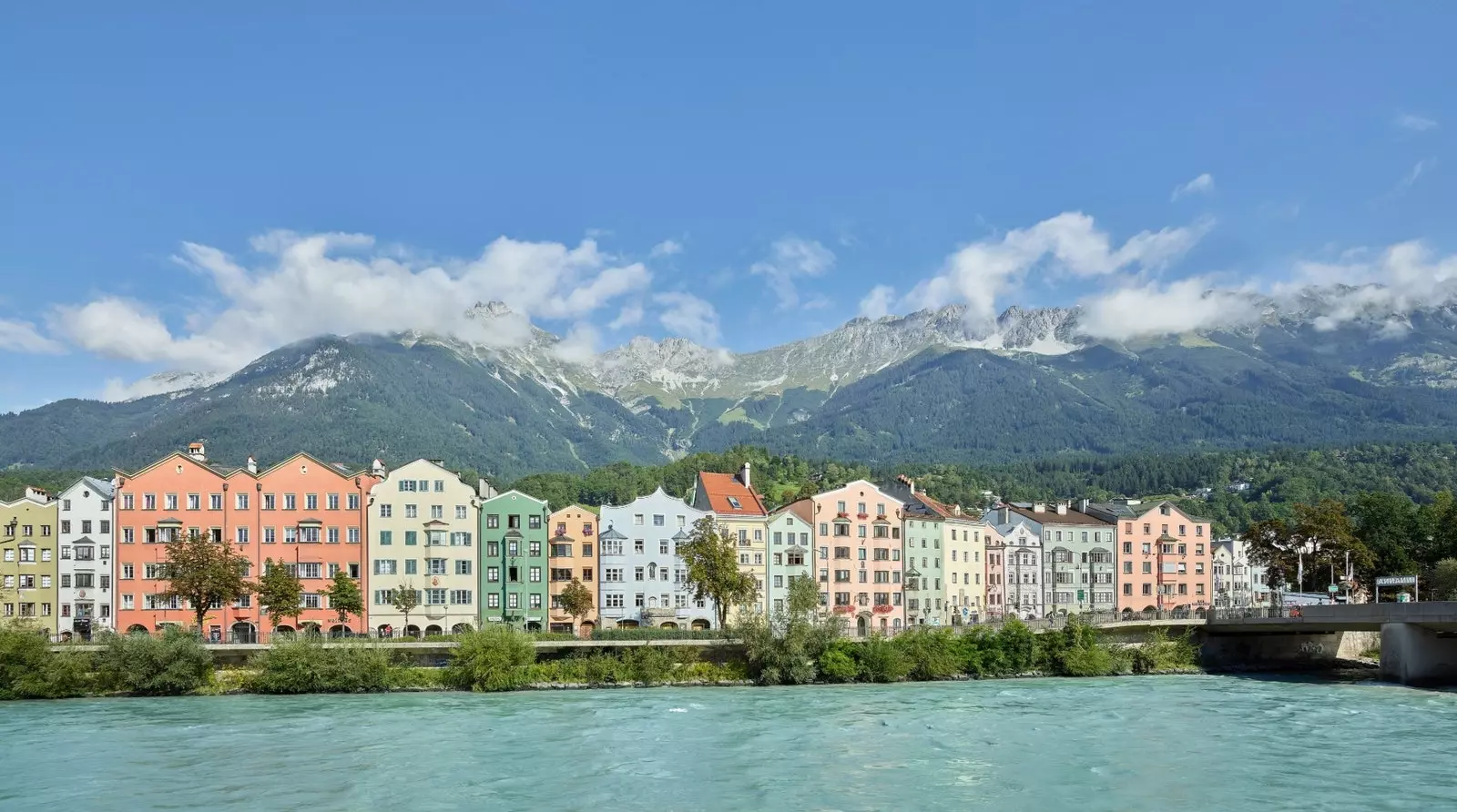 The colorful houses of Mariahilf and the Nordkette mountain range