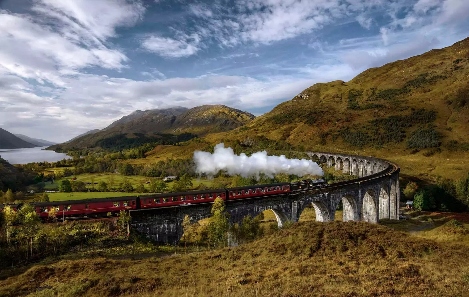 train in english countryside landscape