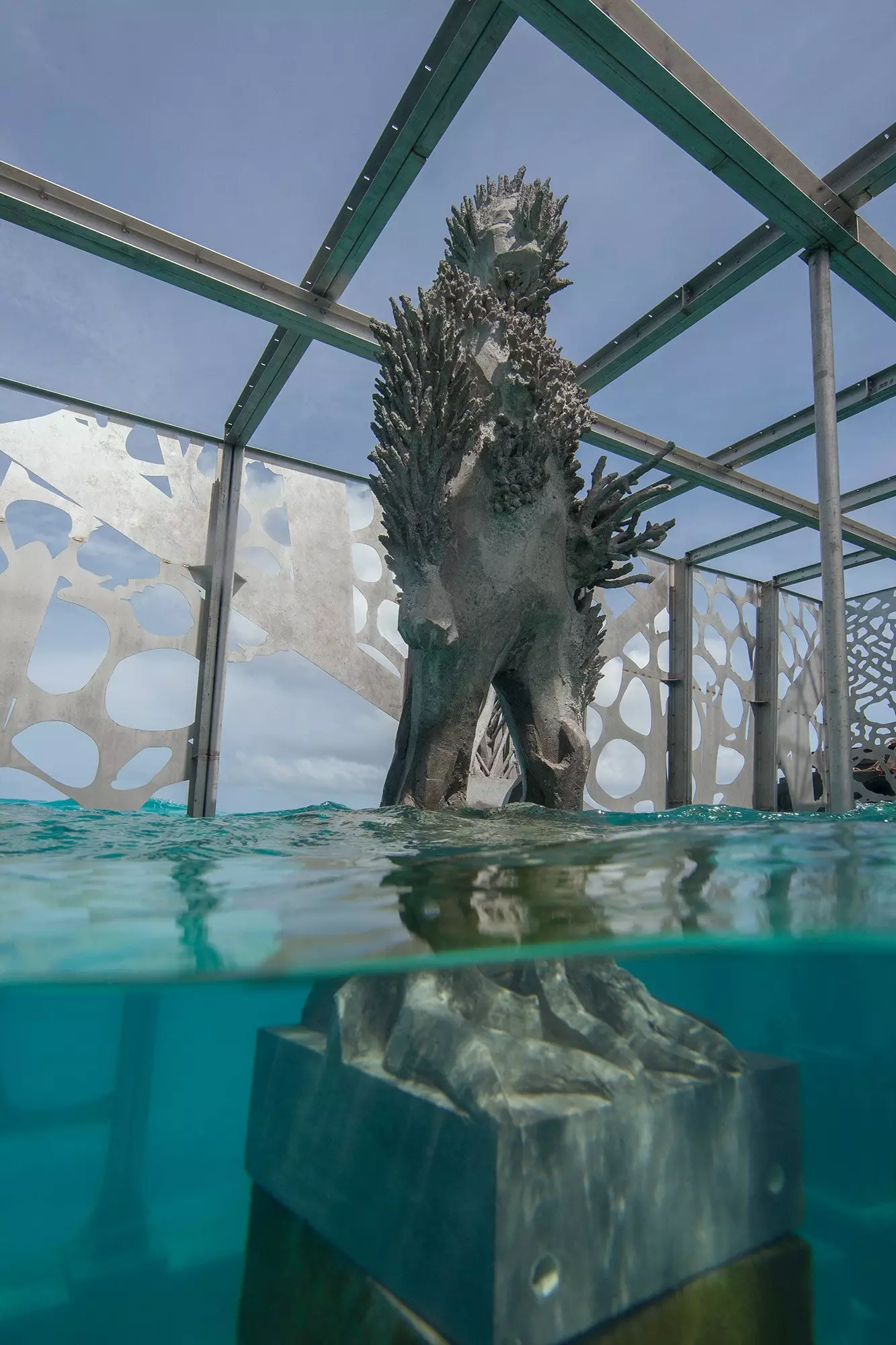 Semi-submerged statues in Coralarium