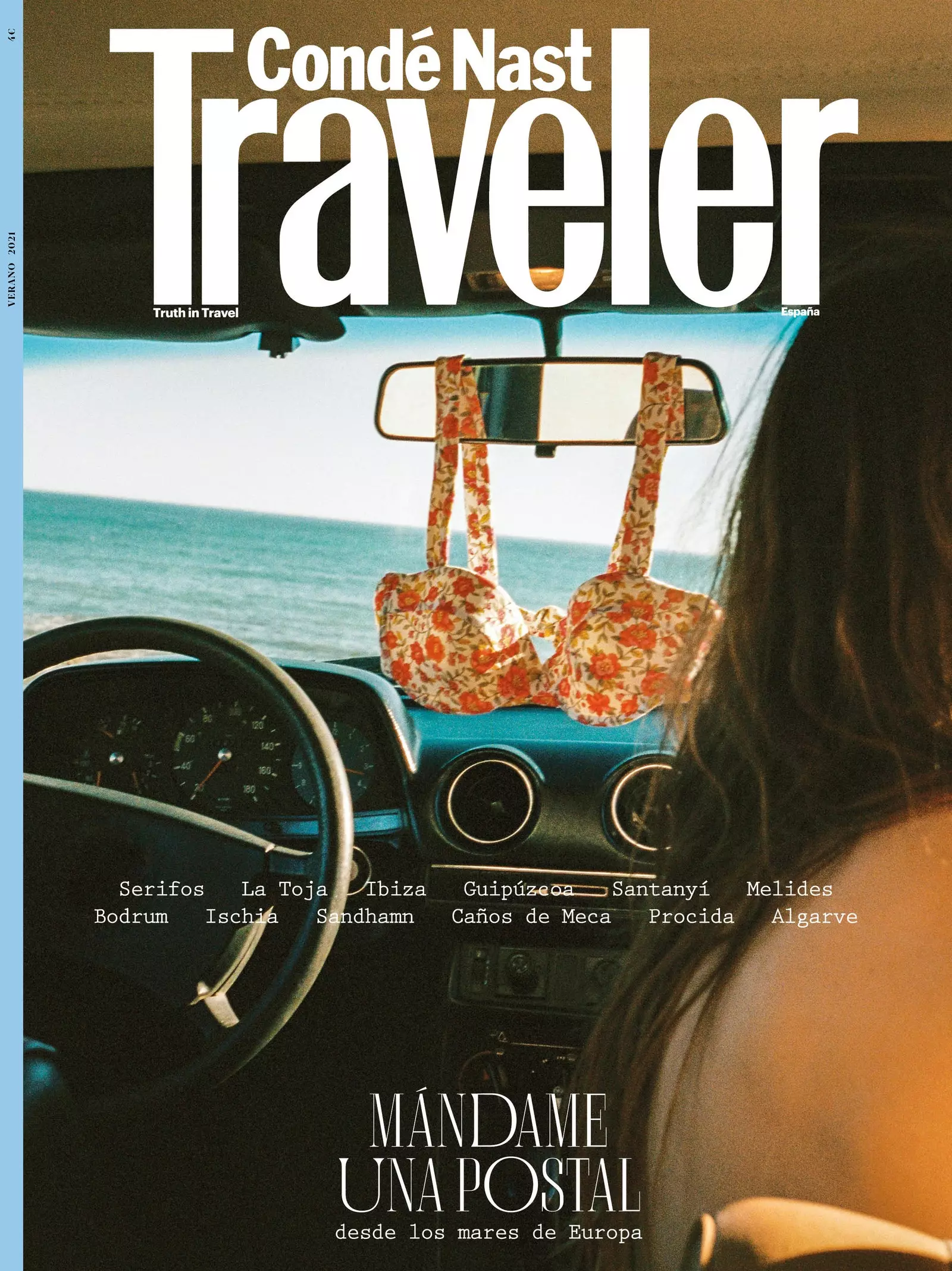 Muka depan gambar º 146 'Cond Nast Traveler Spain' dari dalam kereta semasa seorang gadis menukar pakaian dan...