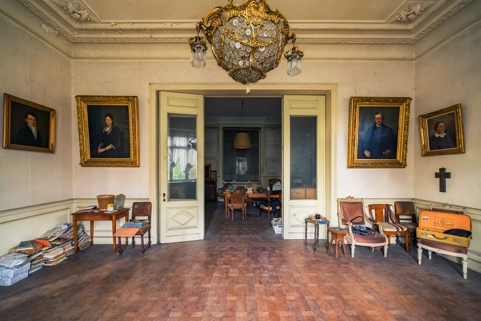 Abandoned house with works of art and books still intact