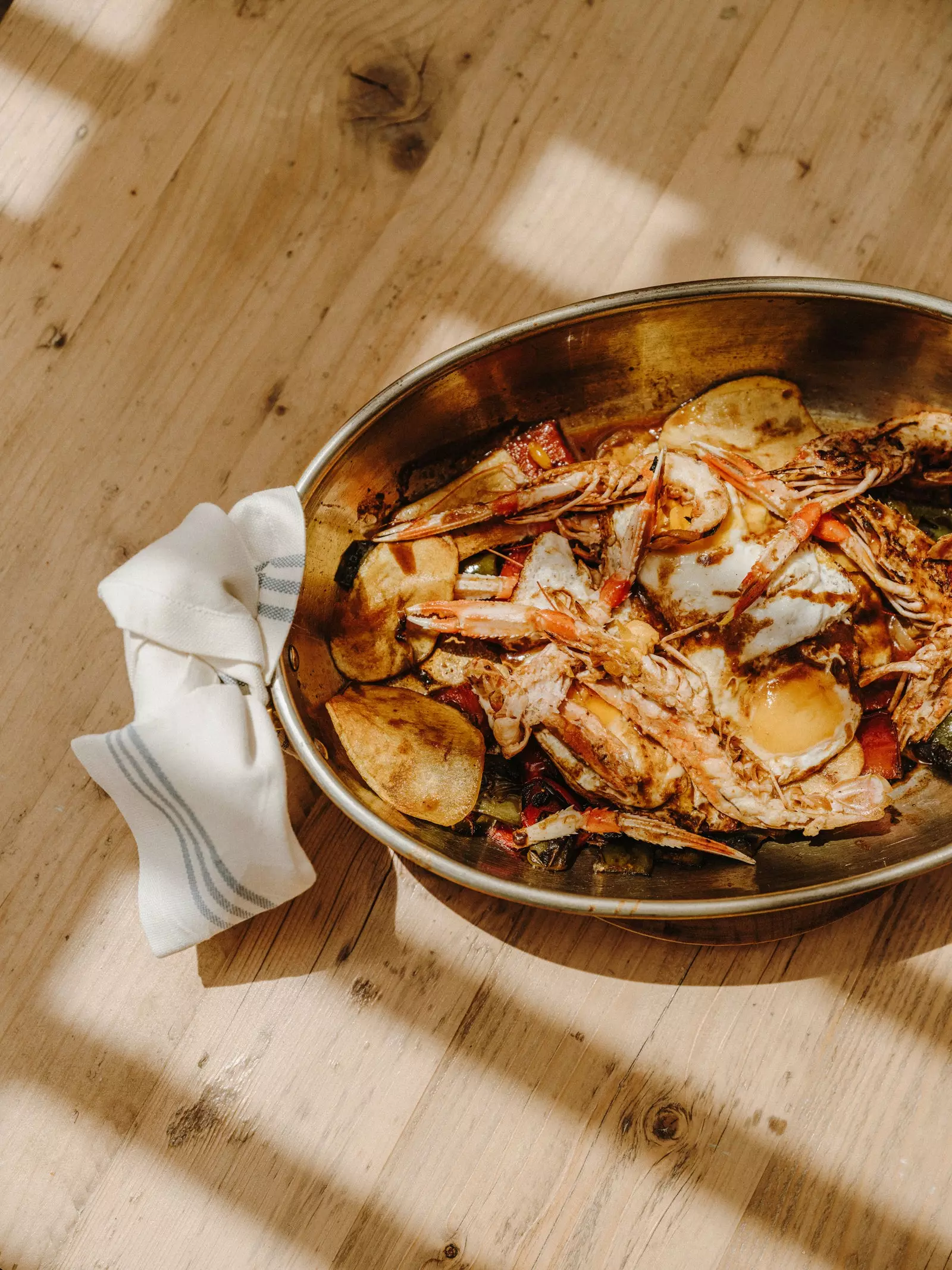 Fried eggs with crayfish.